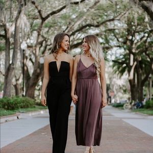 Black plunge neck strapless jumpsuit